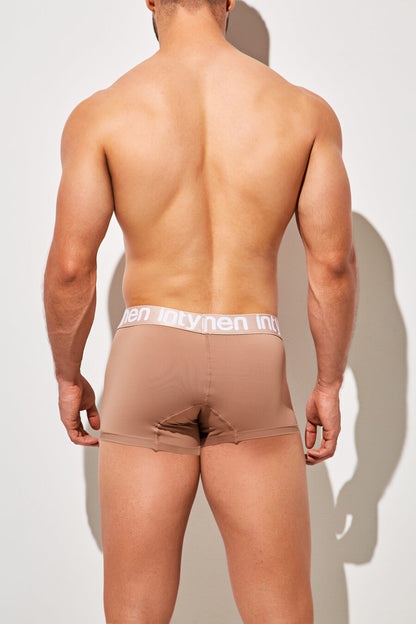 Back view of man wearing mocha Intymen boxer briefs with white logo waistband