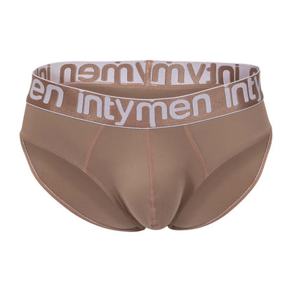Front view – warm beige brief with tonal seams and a contrasting white Intymen logo waistband, offering a sleek, body-defining fit.
