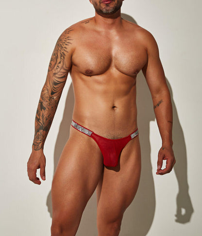 Red micro thong with a low-rise fit and branded waistband.